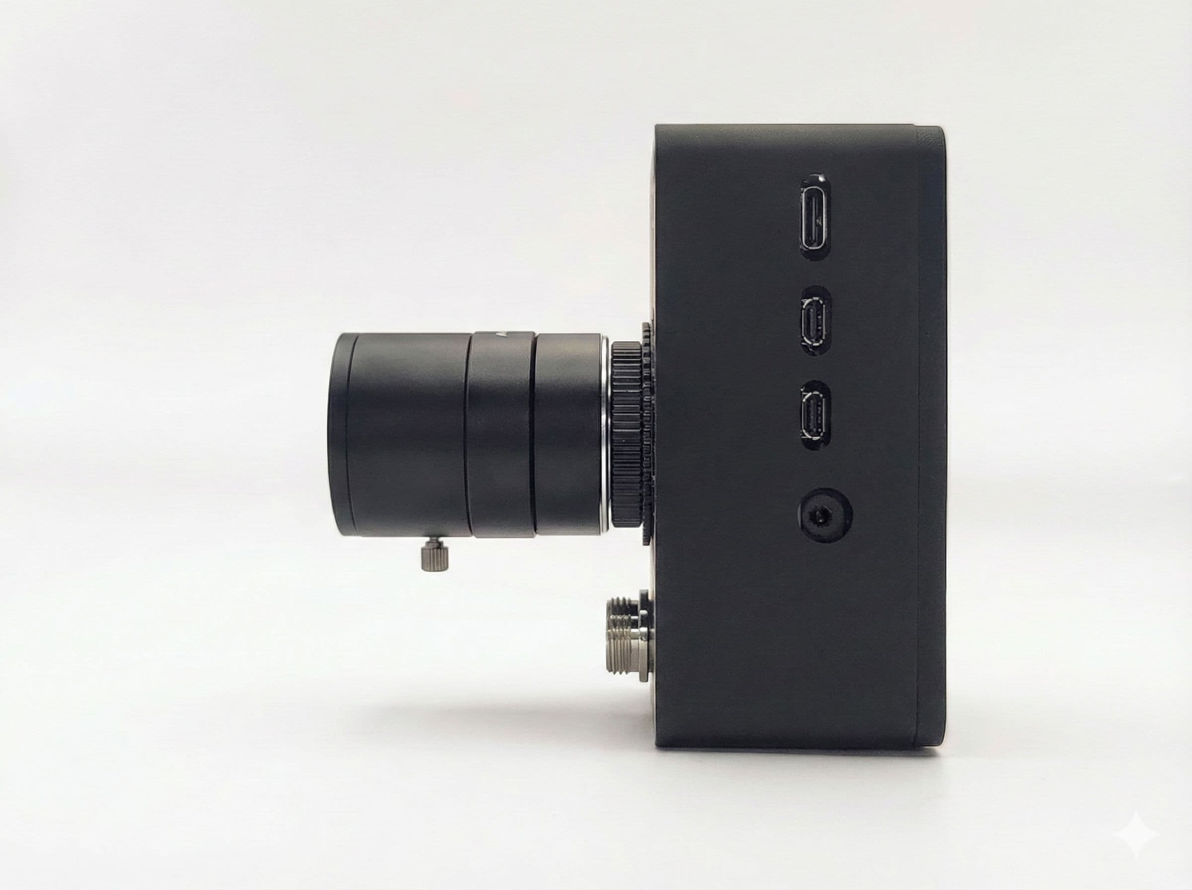 Side view of the enclosed camera unit showing its service ports